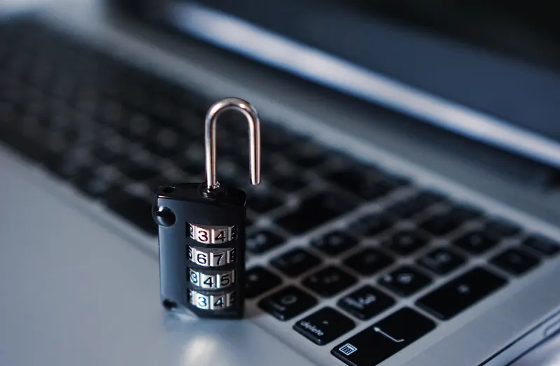 Padlock resting on a computer keyboard